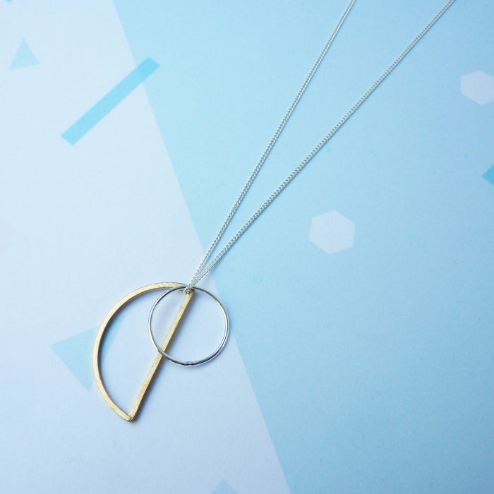 Locus, long sterling silver geometric charm necklace